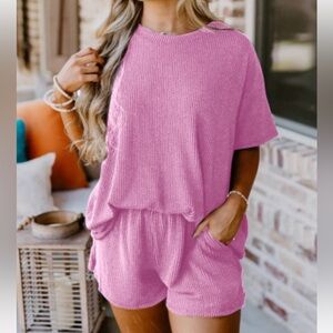 Two piece leisure wear, shorts & short sleeve